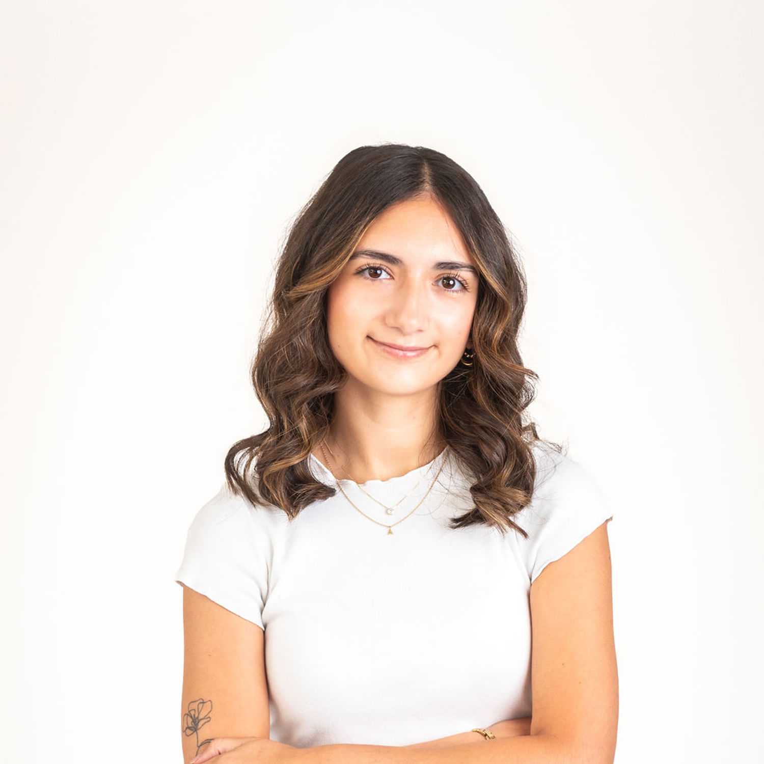 Portrait of Jazmyn, a professional stylist at Cactus Hair Salon, showcasing their expertise and style.