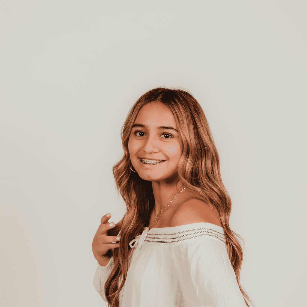 Portrait of Itzel, a professional stylist at Cactus Hair Salon, showcasing their expertise and style.